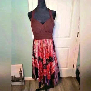 Cato Halter top With adjustable tie knot at the neck size 10